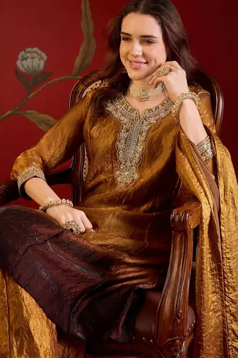 Brown tissue satin embroidered anarkali kurta sharara set with dupatta.