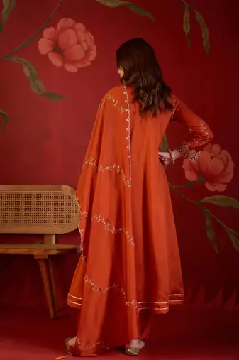 Orange silk blend embroidered anarkali kurta set with dupatta.