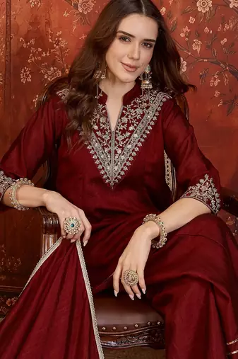 Maroon silk blend embroidered kurta sharara set with Dupatta.