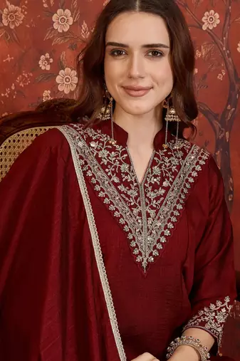 Maroon silk blend embroidered kurta sharara set with Dupatta.