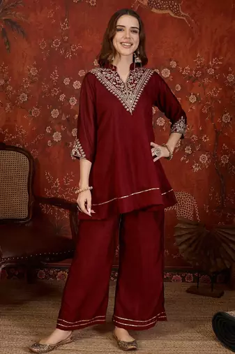 Maroon silk blend embroidered kurta sharara set with Dupatta.