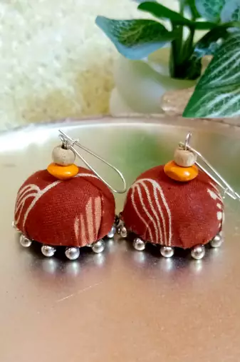 brown fabric traditional jhumka earrings