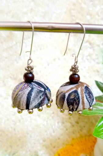white fabric traditional jhumka earrings