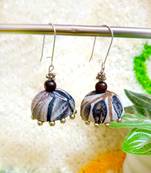 white fabric traditional jhumka earrings