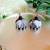 white fabric traditional jhumka earrings