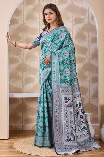 Rama green banarasi cotton silk kota saree with woven zari work, floral pallu and blouse