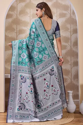 Rama green banarasi cotton silk kota saree with woven zari work, floral pallu and blouse