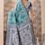 Rama green banarasi cotton silk kota saree with woven zari work, floral pallu and blouse