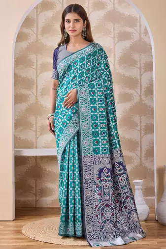 Rama green banarasi cotton silk kota saree with woven zari work, floral pallu and blouse
