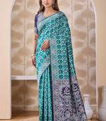 Rama green banarasi cotton silk kota saree with woven zari work, floral pallu and blouse