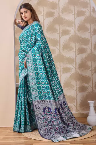 Rama green banarasi cotton silk kota saree with woven zari work, floral pallu and blouse