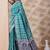 Rama green banarasi cotton silk kota saree with woven zari work, floral pallu and blouse