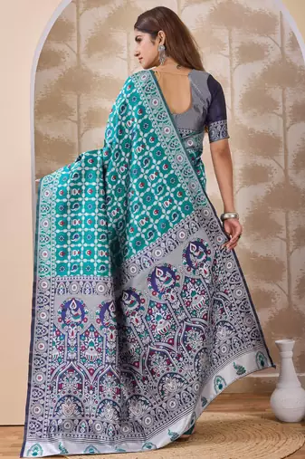 Rama green banarasi cotton silk kota saree with woven zari work, floral pallu and blouse