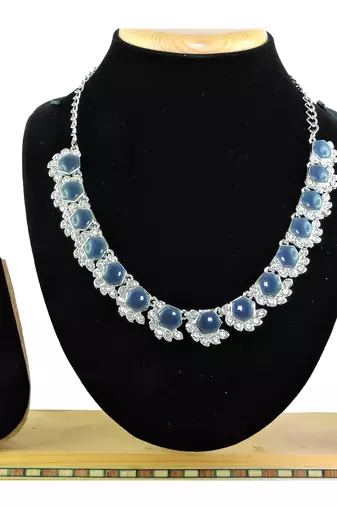 Beige color rhodium plating festive wear designer necklace set
