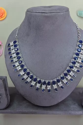 Beige color rhodium plating festive wear designer necklace set