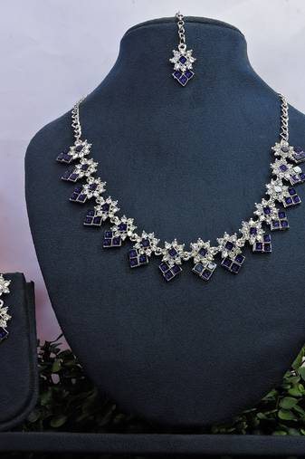 Beige color rhodium plating festive wear designer necklace set