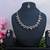 Beige color rhodium plating festive wear designer necklace set