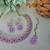 Purple color yellow gold plating festive wear designer necklace set