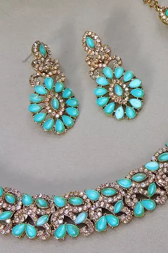 Green color yellow gold plating festive wear designer necklace set