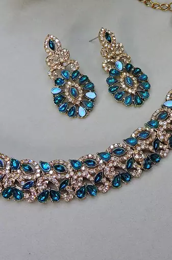 Green color yellow gold plating festive wear designer necklace set