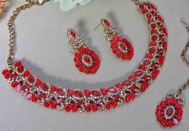 Red color yellow gold plating festive wear designer necklace set
