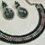 Green color yellow gold plating festive wear designer necklace set