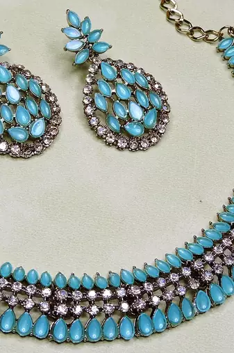 Green color yellow gold plating festive wear designer necklace set