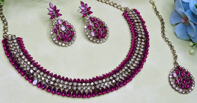 Pink color yellow gold plating festive wear designer necklace set