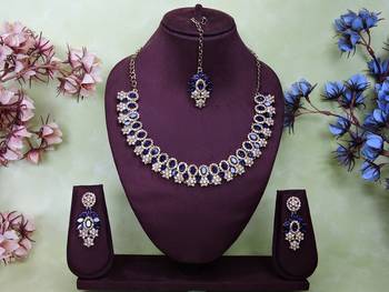 Beige color yellow gold plating festive wear designer necklace set 1