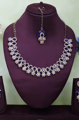 Beige color yellow gold plating festive wear designer necklace set