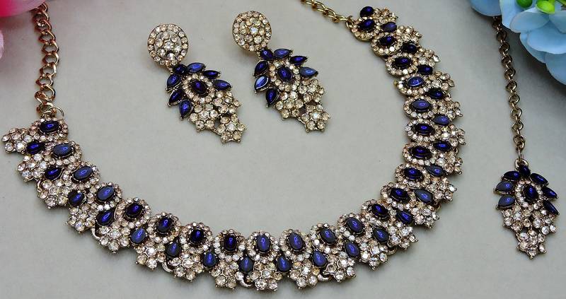 Beige color yellow gold plating festive wear designer necklace set