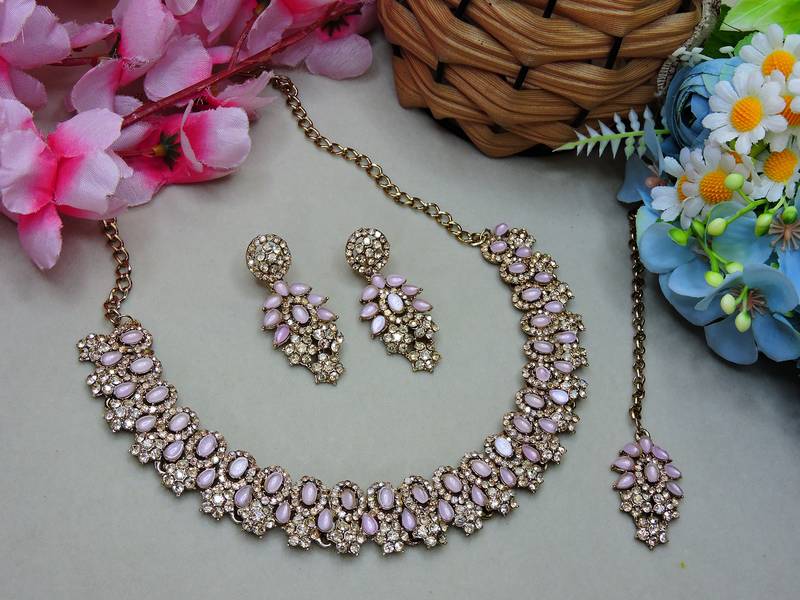 Pink color yellow gold plating festive wear designer necklace set