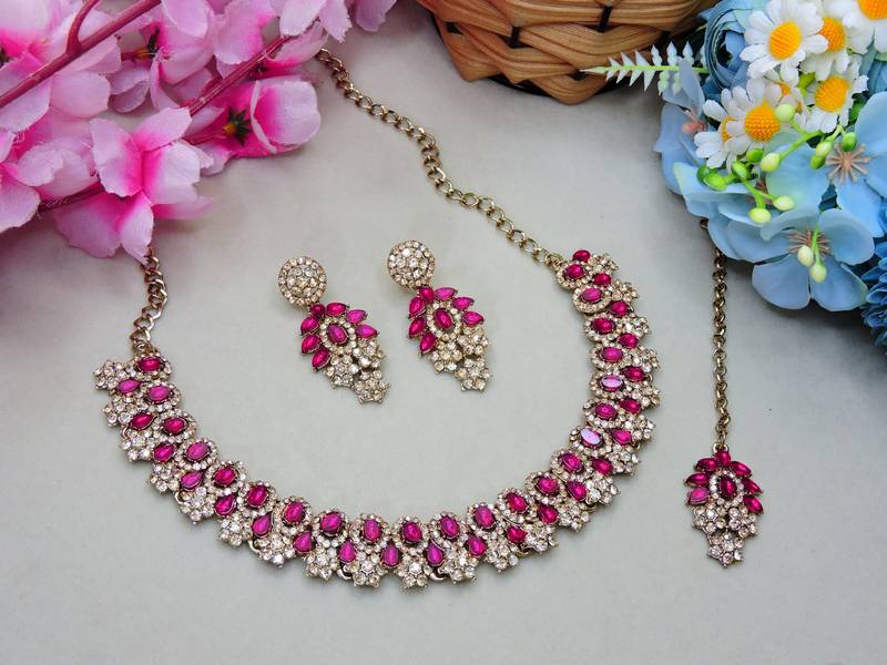 Pink color yellow gold plating festive wear designer necklace set