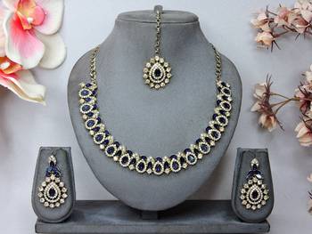 Beige color yellow gold plating festive wear designer necklace set 1