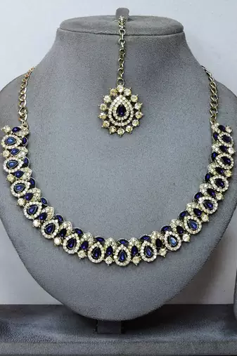 Beige color yellow gold plating festive wear designer necklace set