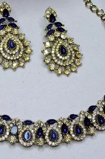 Beige color yellow gold plating festive wear designer necklace set
