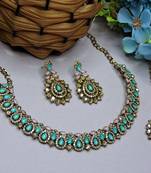Green color yellow gold plating festive wear designer necklace set