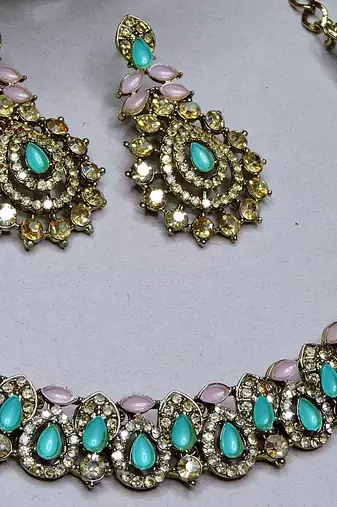 Green color yellow gold plating festive wear designer necklace set