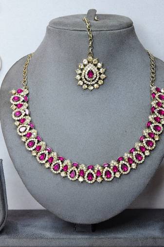 Pink color yellow gold plating festive wear designer necklace set