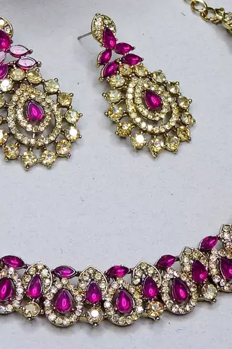 Pink color yellow gold plating festive wear designer necklace set
