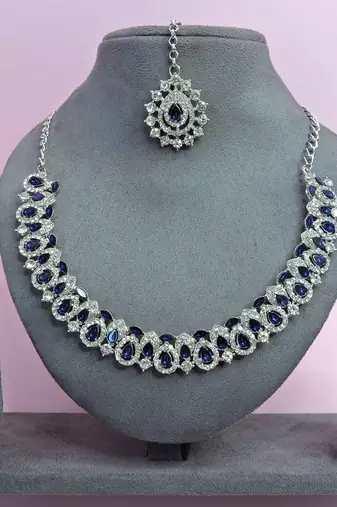 Beige color rhodium plating festive wear designer necklace set