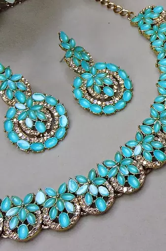 Green color yellow gold plating festive wear designer necklace set