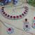 Red color rhodium plating festive wear designer necklace set