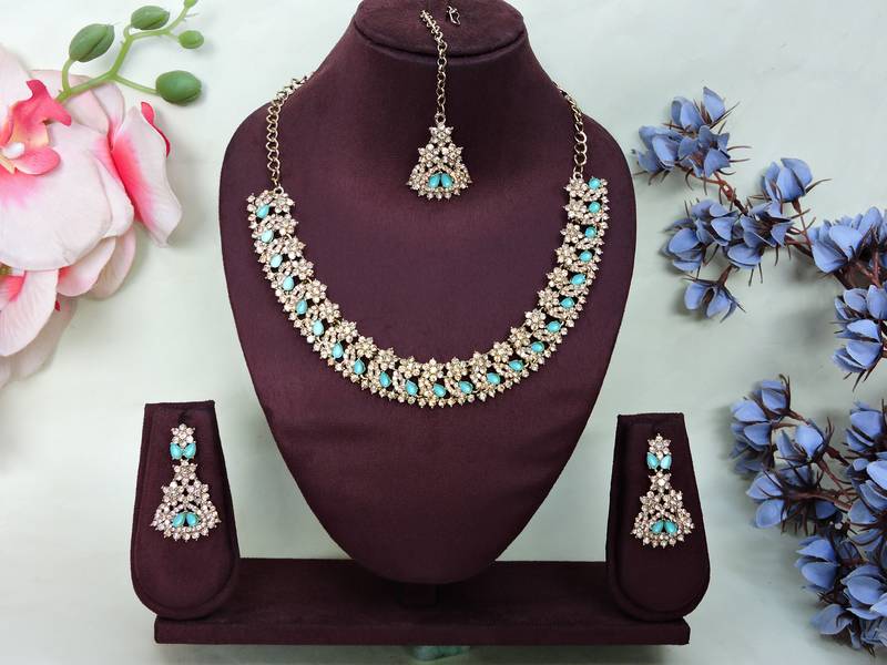 Green color yellow gold plating festive wear designer necklace set