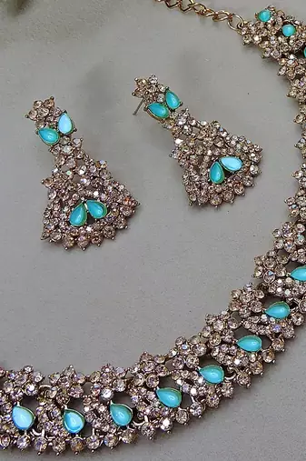 Green color yellow gold plating festive wear designer necklace set