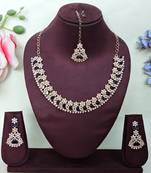 Beige color yellow gold plating festive wear designer necklace set