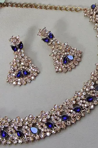 Beige color yellow gold plating festive wear designer necklace set