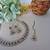 Green color yellow gold plating festive wear designer necklace set