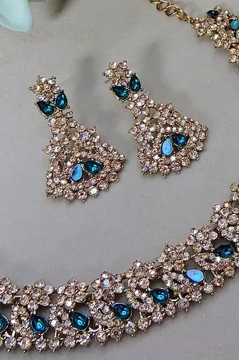 Green color yellow gold plating festive wear designer necklace set