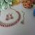 Pink color yellow gold plating festive wear designer necklace set